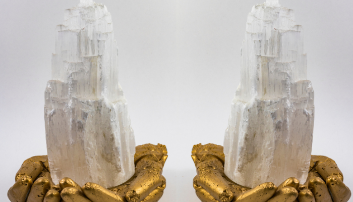 Selenite forms gold hand