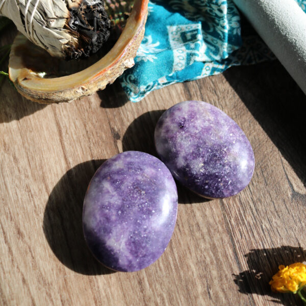 Natural oval lepidolite palm stone