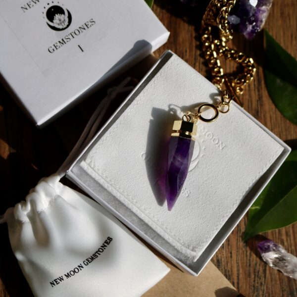 Gorgeous amethyst chain necklace on jewelry pouch
