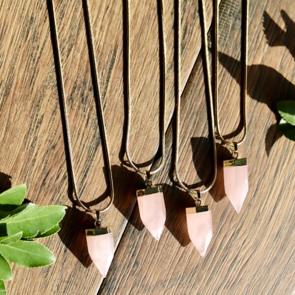 Natural rose quartz crystal point necklace natural 18k gold chain. Top view